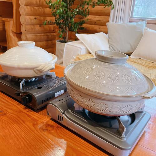 a pot on a stove with a bowl on top at 'OLI' OLI tree - Vacation STAY 39608v in Takashima