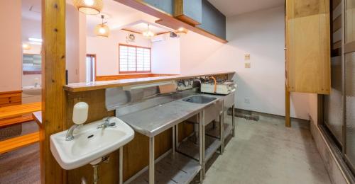 Kuchyň nebo kuchyňský kout v ubytování VILLENT Kujukuri Marine - Vacation STAY 44476v