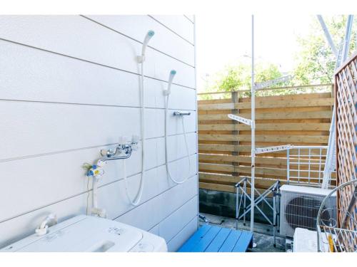 a bathroom with a shower and a sink at Oasis Wadaura - Vacation STAY 85735v in Kamogawa