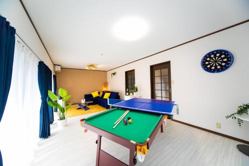 a living room with a pool table in it at Yokkaichi - House - Vacation STAY 14171 in Yokkaichi