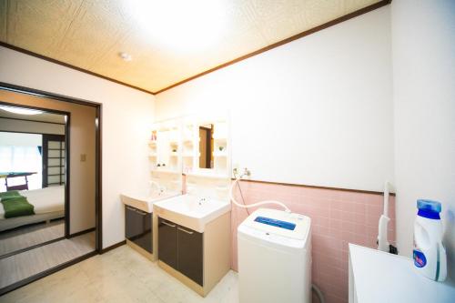 a bathroom with a sink and a toilet at Yokkaichi - House - Vacation STAY 14171 in Yokkaichi