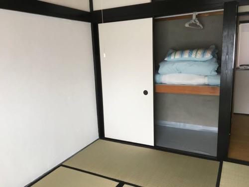 Giường trong phòng chung tại Oasis Wadaura - Vacation STAY 67381v