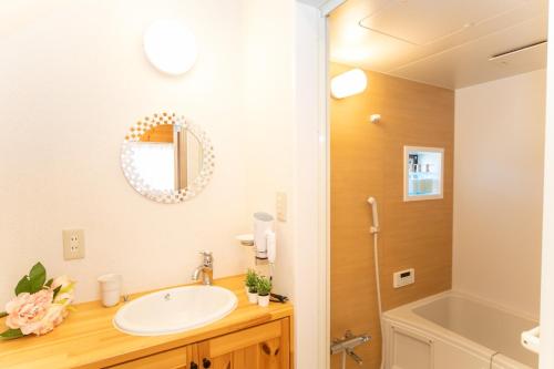 a bathroom with a sink and a shower at Yokkaichi - House - Vacation STAY 68045v in Yokkaichi