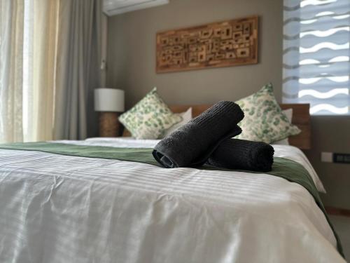 Katil atau katil-katil dalam bilik di Fleur&Sel Westcoast Villa