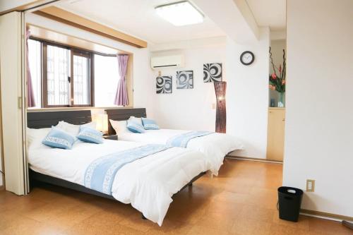 Postel nebo postele na pokoji v ubytování Maison Tsunami - Vacation STAY 79591v