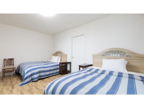 Letto o letti in una camera di TEA TREES - Vacation STAY 86532v