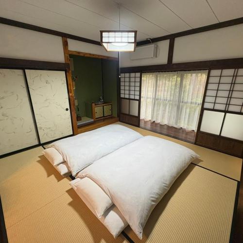 Postel nebo postele na pokoji v ubytování Mitsutoge no Yado - Vacation STAY 14305