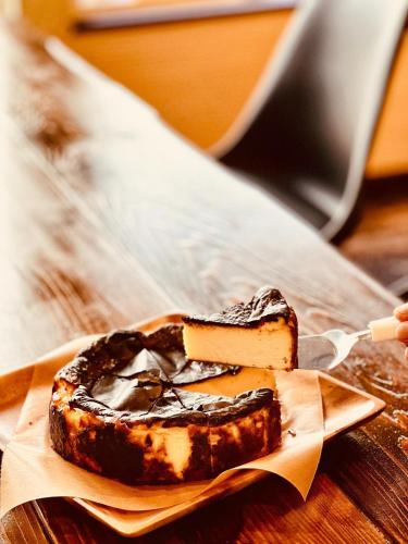 a piece of cake on a plate on a table at Populus-club Otaru - Vacation STAY 93686v in Otaru