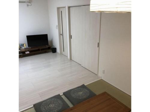 Телевизор и/или развлекательный центр в Sunset Village - Vacation STAY 15325v