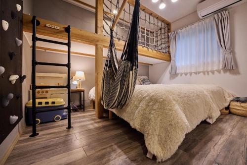 Un pat sau paturi într-o cameră la Villa Hanasaku Karuizawa Miyota - Vacation STAY 14347v