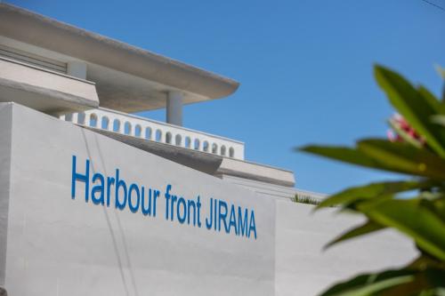 a sign on the side of a hospital building at Harbor front JIRAMA 1 - Vacation STAY 14658 in Suno
