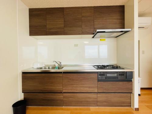 Η κουζίνα ή μικρή κουζίνα στο Uhome Kamogawa Main Building - Vacation STAY 38355v