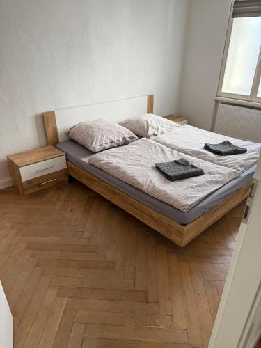 a bedroom with a bed with two towels on it at Villa Rathenow in Rathenow