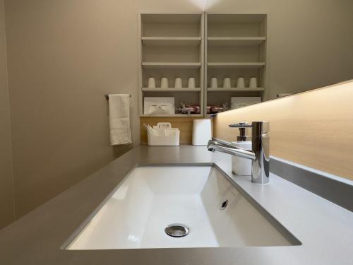 a bathroom with a sink in a counter top at SETO CLAS AJI - Vacation STAY 60978v in Sanuki