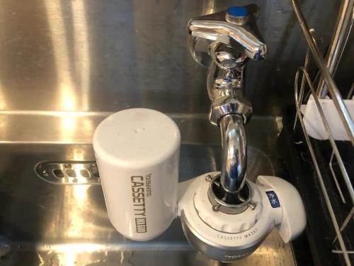 a coffee cup sitting next to a kitchen sink at Whole house rental inn Umu - Vacation STAY 60715v in Maibara