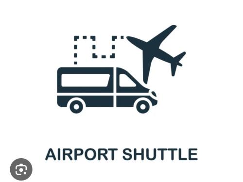 an airport shuttle with an airplane and a bus at Dar Tiziri Amizmiz in Marrakech