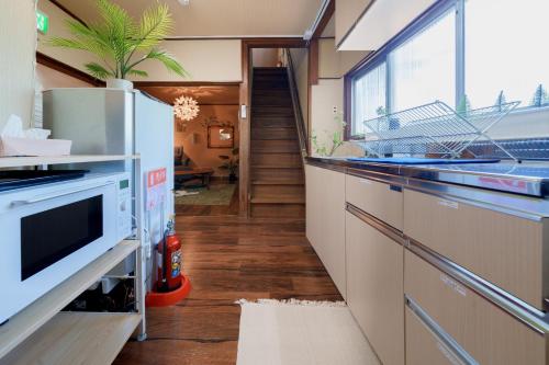 a kitchen with a sink and a dishwasher at R-house 2nd - Vacation STAY 14825 in Yokohama