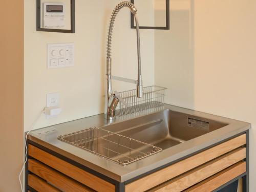 a stainless steel kitchen sink with a faucet at ZIPANG - Vacation STAY 20291v in Matsue
