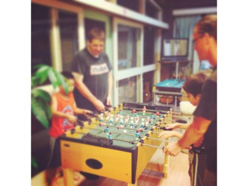 a group of people playing with a large chessboard at Amanohashidate Youth Hostel - Vacation STAY 94808v in Miyazu