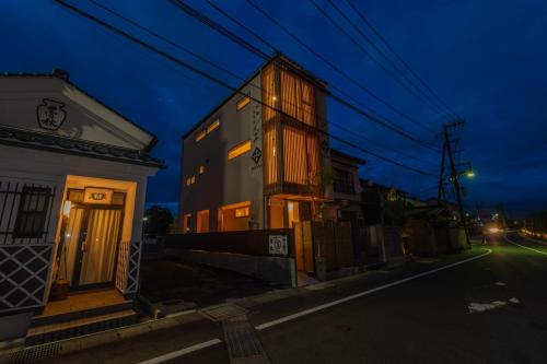 a building on the side of a street at night at ZIPANG - Vacation STAY 02088v in Matsue
