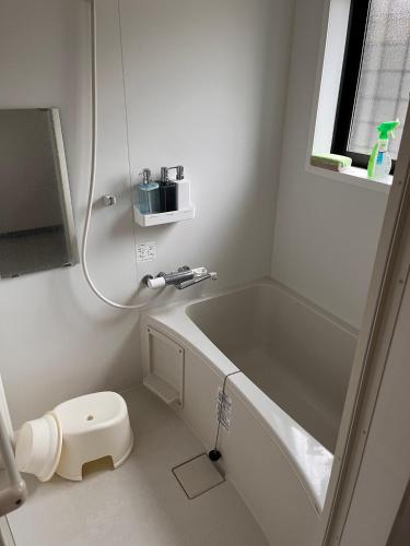 a bathroom with a shower and a sink and a toilet at Guesthouse Hatenashi - Vacation STAY 43934v in Hongu