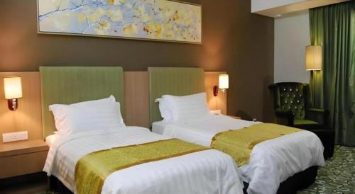 Ένα ή περισσότερα κρεβάτια σε δωμάτιο στο Hotel AIFA