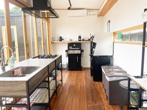 a kitchen with a sink and a stove at HOLE37 - Vacation STAY 42190v in Hōjō