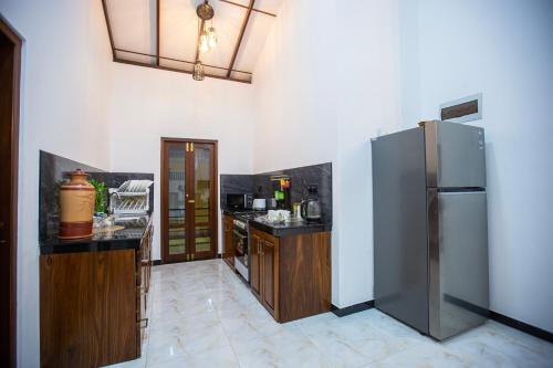 Η κουζίνα ή μικρή κουζίνα στο Villa Pearl Breeze
