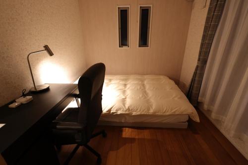 Postel nebo postele na pokoji v ubytování Saifu House - Vacation STAY 29910v