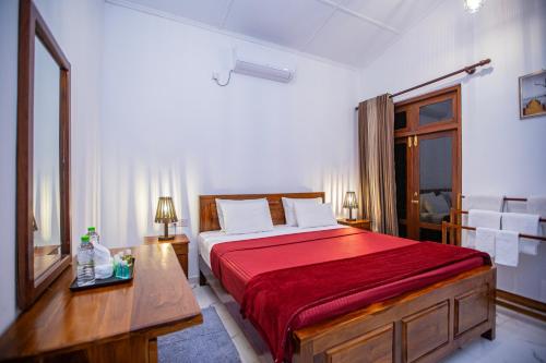 Ένα ή περισσότερα κρεβάτια σε δωμάτιο στο Villa Pearl Breeze
