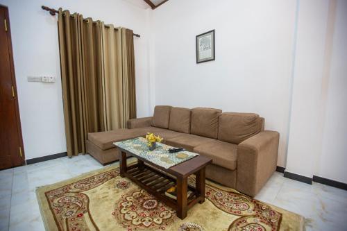 Χώρος καθιστικού στο Villa Pearl Breeze
