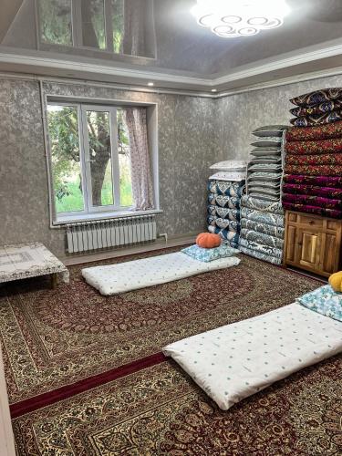 Postel nebo postele na pokoji v ubytování Light of Heart Homestay