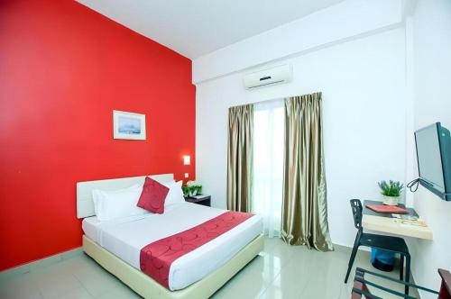 Katil atau katil-katil dalam bilik di Hotel Kobemas Melaka