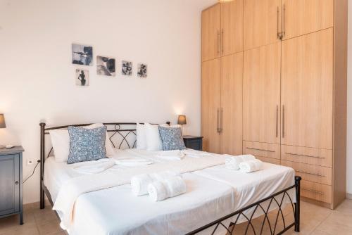 Postel nebo postele na pokoji v ubytování Villa Kalliope