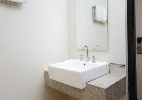 Koupelna v ubytování Hotel Wisata Niaga