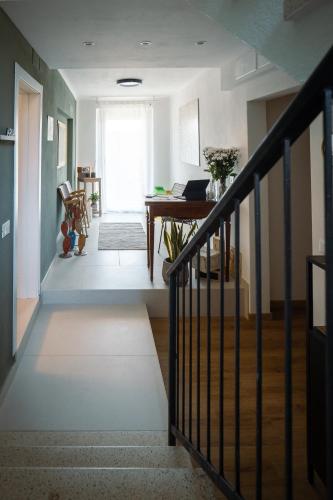 Postel nebo postele na pokoji v ubytování La Croce Apartments