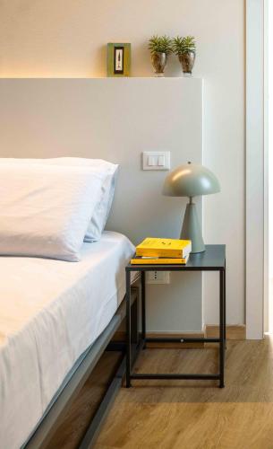 Postel nebo postele na pokoji v ubytování La Croce Apartments