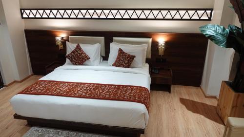 Katil atau katil-katil dalam bilik di Hotel Dayal Tower