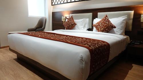 Katil atau katil-katil dalam bilik di Hotel Dayal Tower