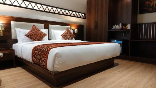 Katil atau katil-katil dalam bilik di Hotel Dayal Tower