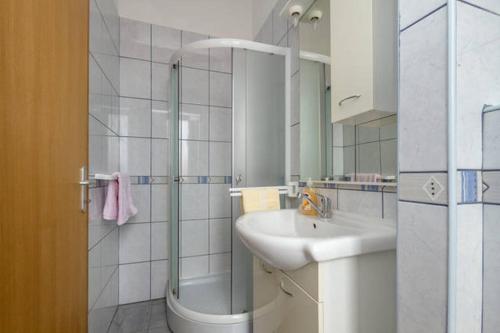 Kúpeľňa v ubytovaní Apartments Calendula Rubic