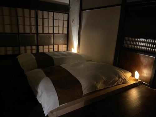 Ένα ή περισσότερα κρεβάτια σε δωμάτιο στο Village IRORI - Vacation STAY 90125v