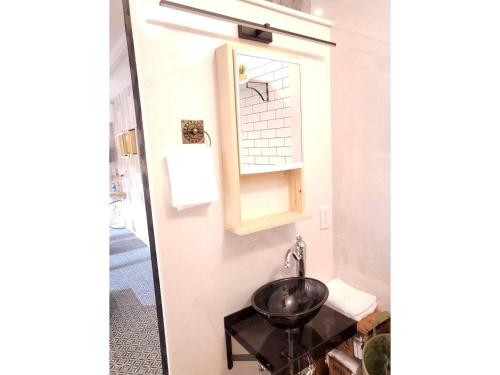 a bathroom with a sink and a window at Seaside Garage Shima - Vacation STAY 77073v in Shima