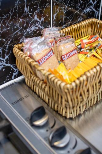 a basket of chips sitting on top of an oven at The Grampians Motel in Halls Gap