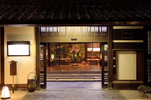 an entrance to a building with a living room at Kaike Fuga in Yonago