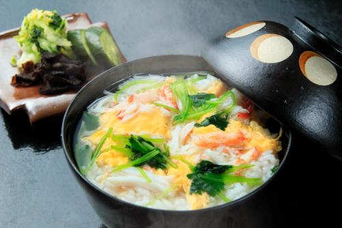 a bowl of food with vegetables and rice at Kaike Fuga in Yonago