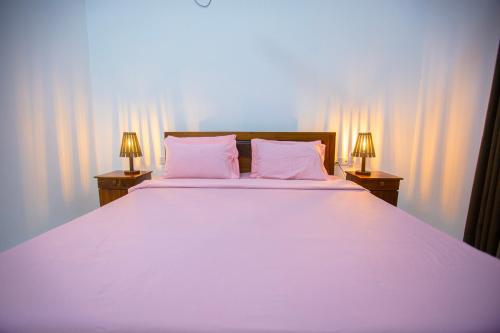 Ένα ή περισσότερα κρεβάτια σε δωμάτιο στο Villa Pearl Breeze