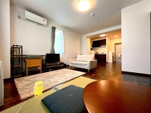 En eller flere senge i et værelse på Hakodatekan - Vacation STAY 07882v