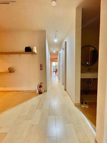 an empty room with a hallway with a tile floor at Yoronto - Vacation STAY 18850v in Yoron