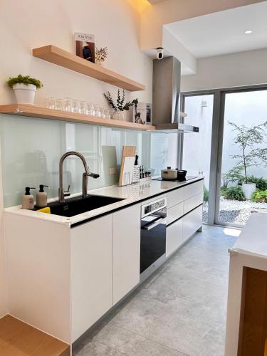 Una cocina o zona de cocina en Hsia Mu Le